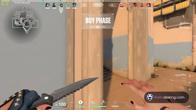 First-person view of a player holding a knife in a shooter game