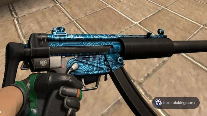 Close-up of a blue circuit pattern paintball gun