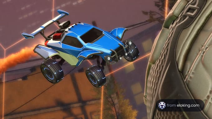 A blue remote-controlled car flying through the air.