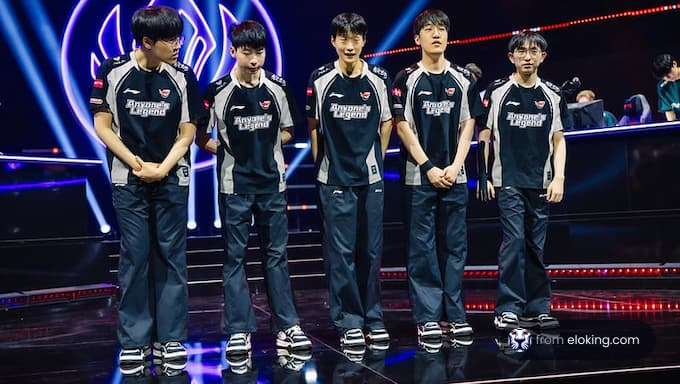 A professional esports team on stage during a tournament event.