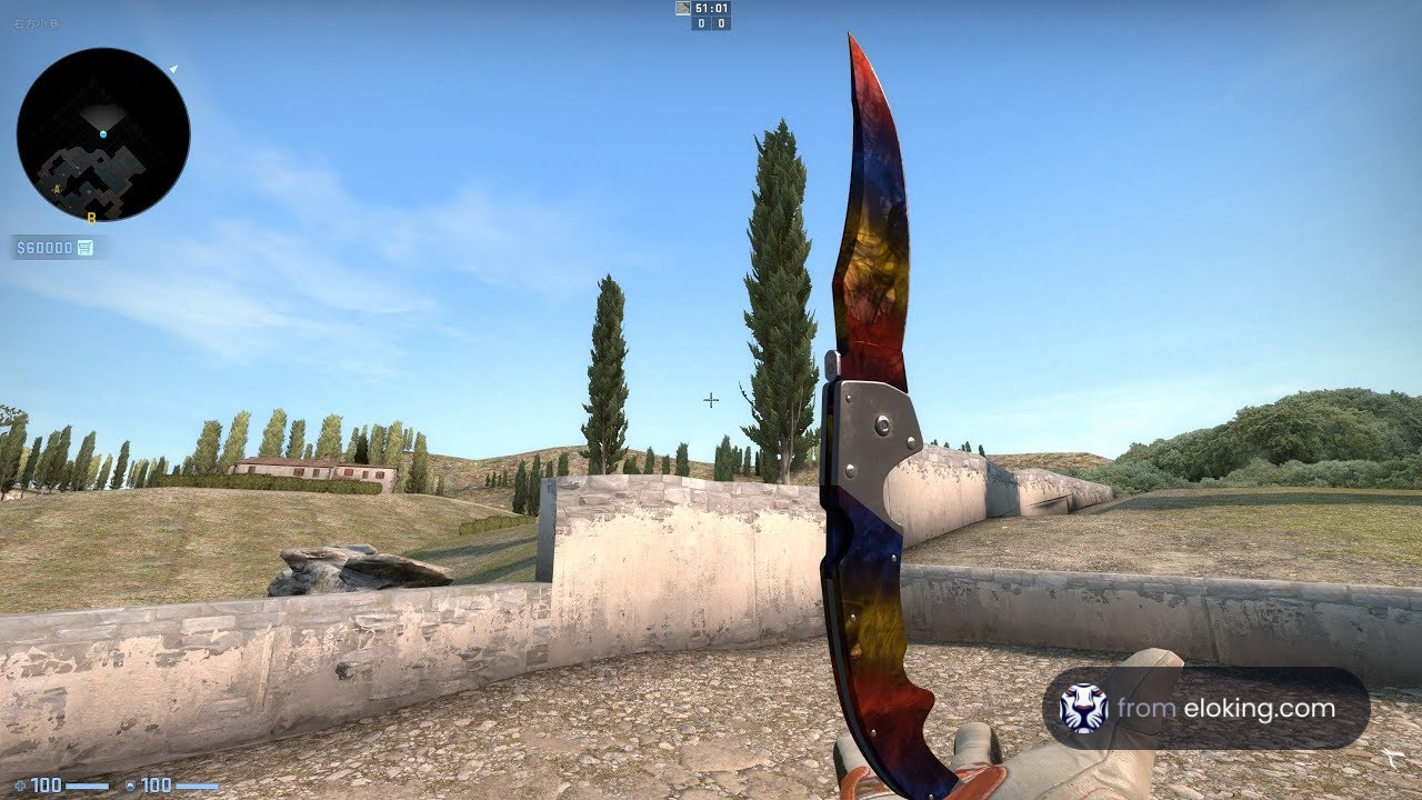 Colorful knife held in first person view in outdoor video game setting