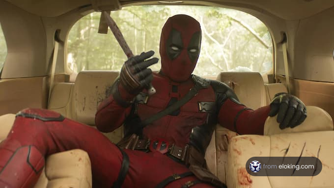 Deadpool character in costume sitting in a car with a pencil