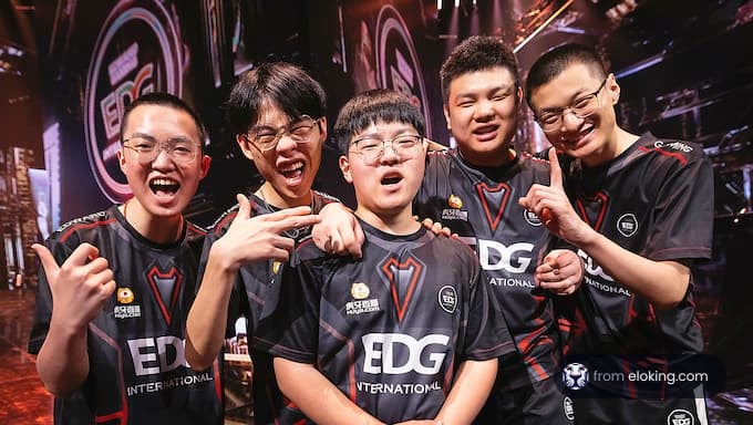 The EDG International gaming team celebrating their victory.