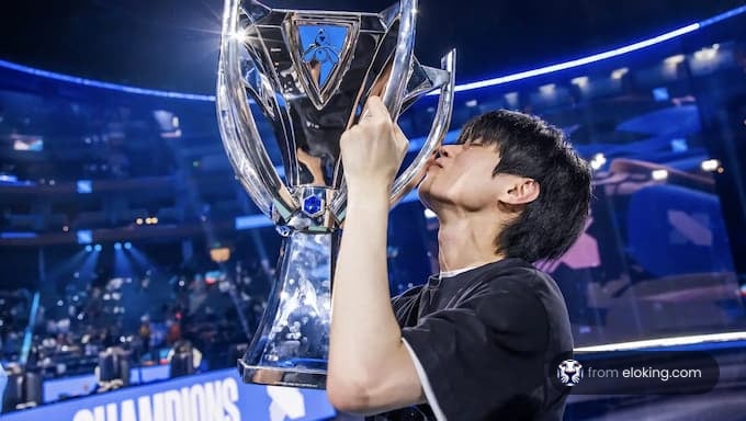 Esports player kissing a trophy at an event