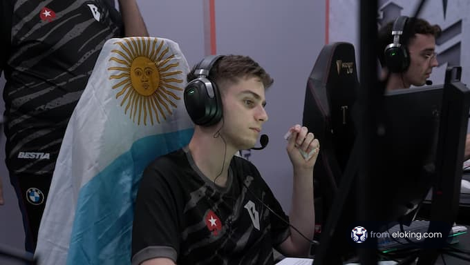 A focused esports player from Argentina during a gaming competition.