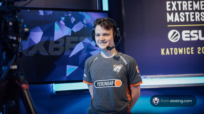 Esports player smiling while competing at Extreme Masters Katowice 2023
