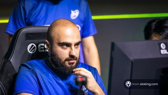 A focused esports player in a gaming competition.
