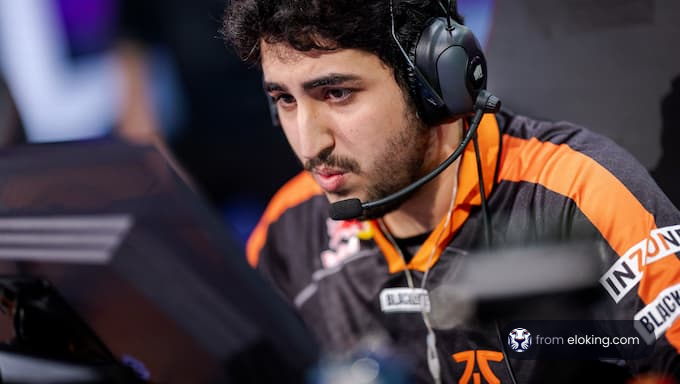 An esports player focused during a gaming event.