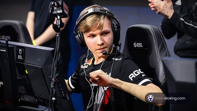 An esports player celebrating during a gaming competition