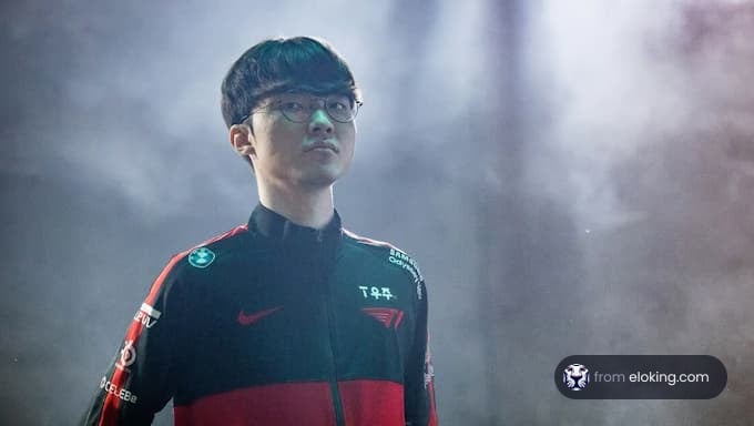 Esports player focused during a game with a smoky background