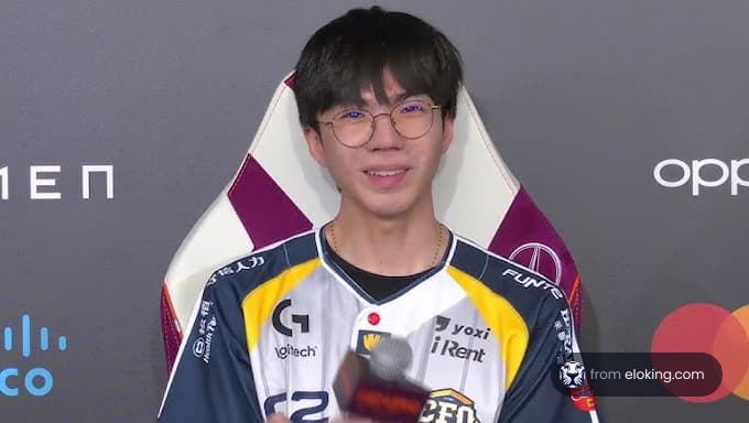 An esports player smiling during an interview.