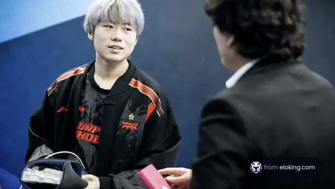 Esports player receiving a gift