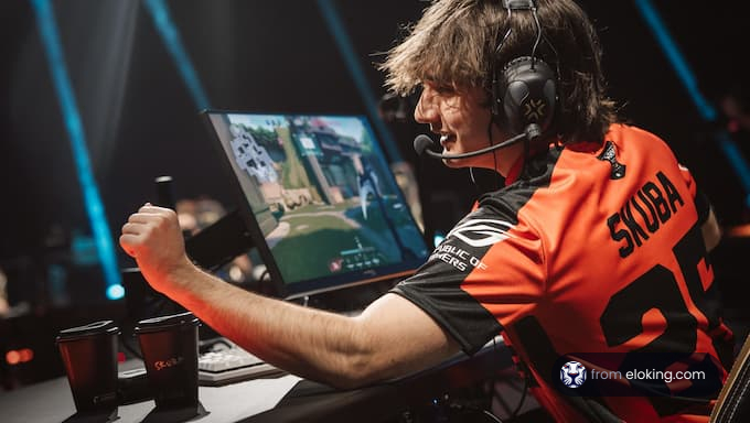 An esports player celebrating a game victory.