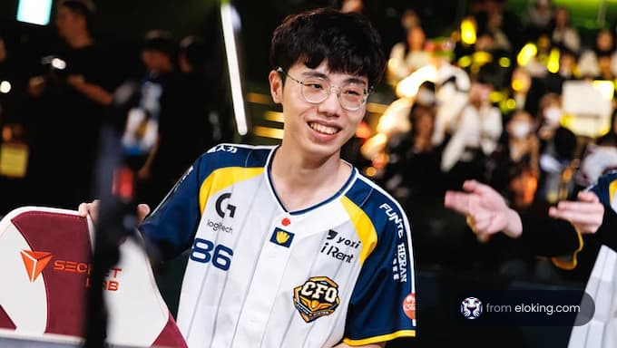 A smiling esports player at an event