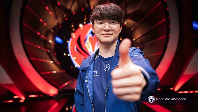 Esports player giving a thumbs up at an event.
