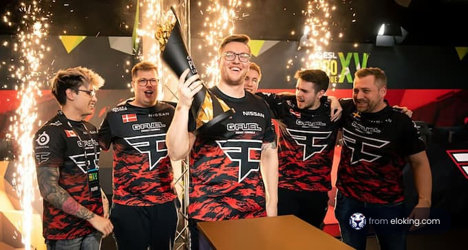 Esports team celebrating a victory with a trophy