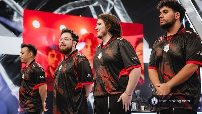 Esports team players on stage during a tournament