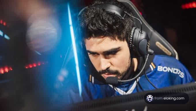 Ein Esport-Spieler, der sich intensiv während eines Wettkampfs konzentriert.