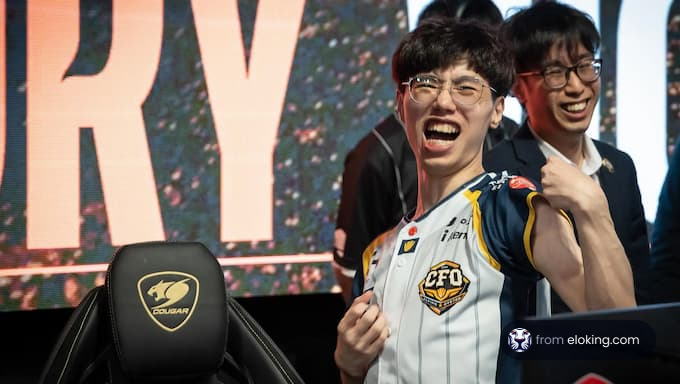 Excited esports player celebrating a victory.