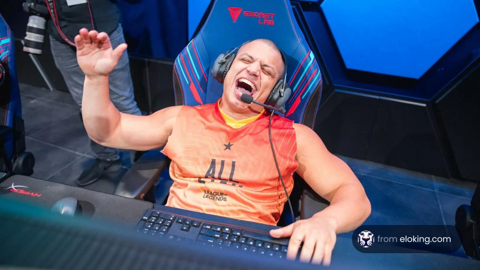 Excited gamer celebrates enthusiastically at an esports event