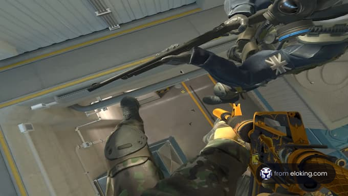First-person view in a shooter game showing an armed character and robotic arm