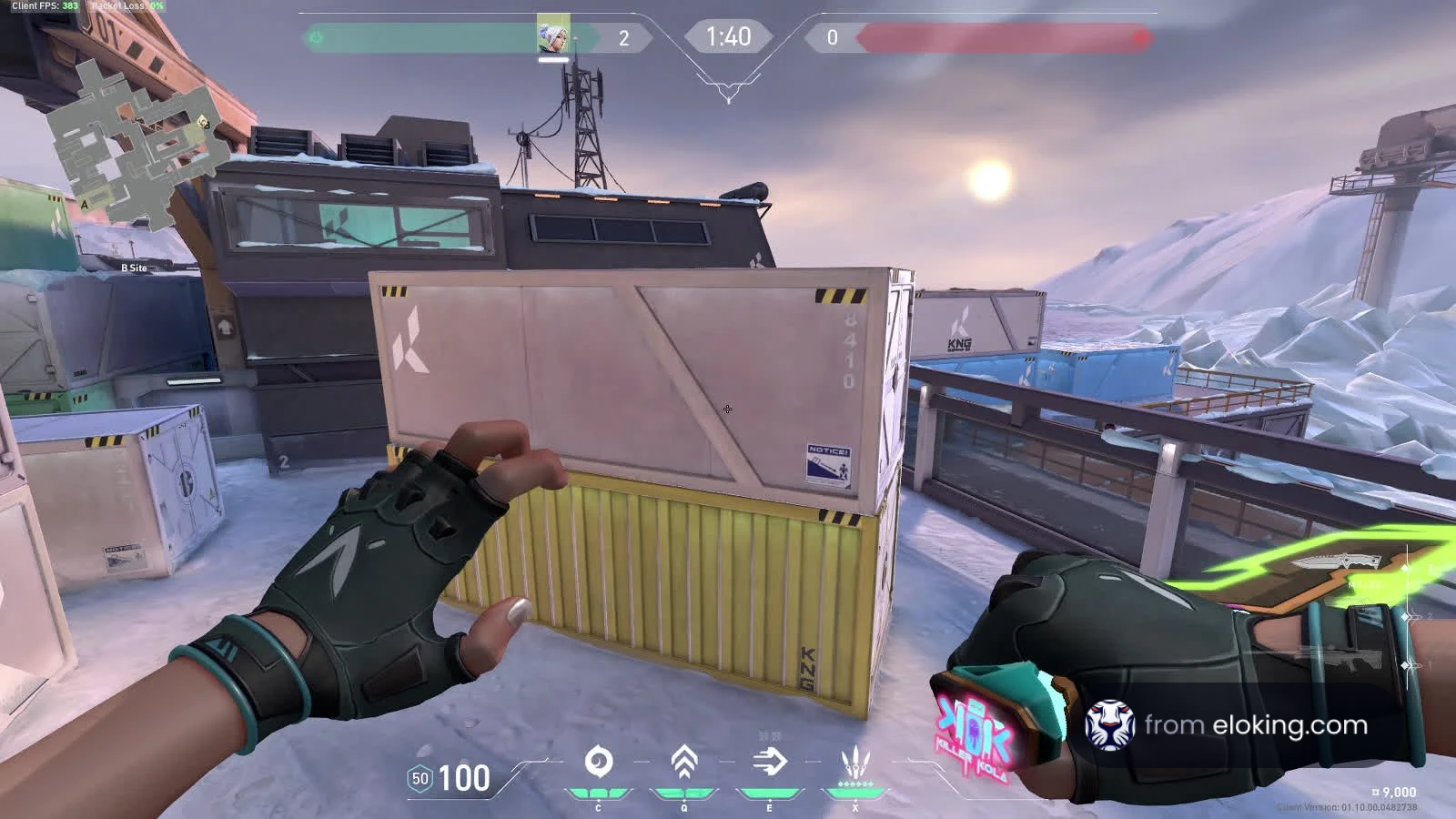 First-person view of a player in a futuristic shooter game on an icy map