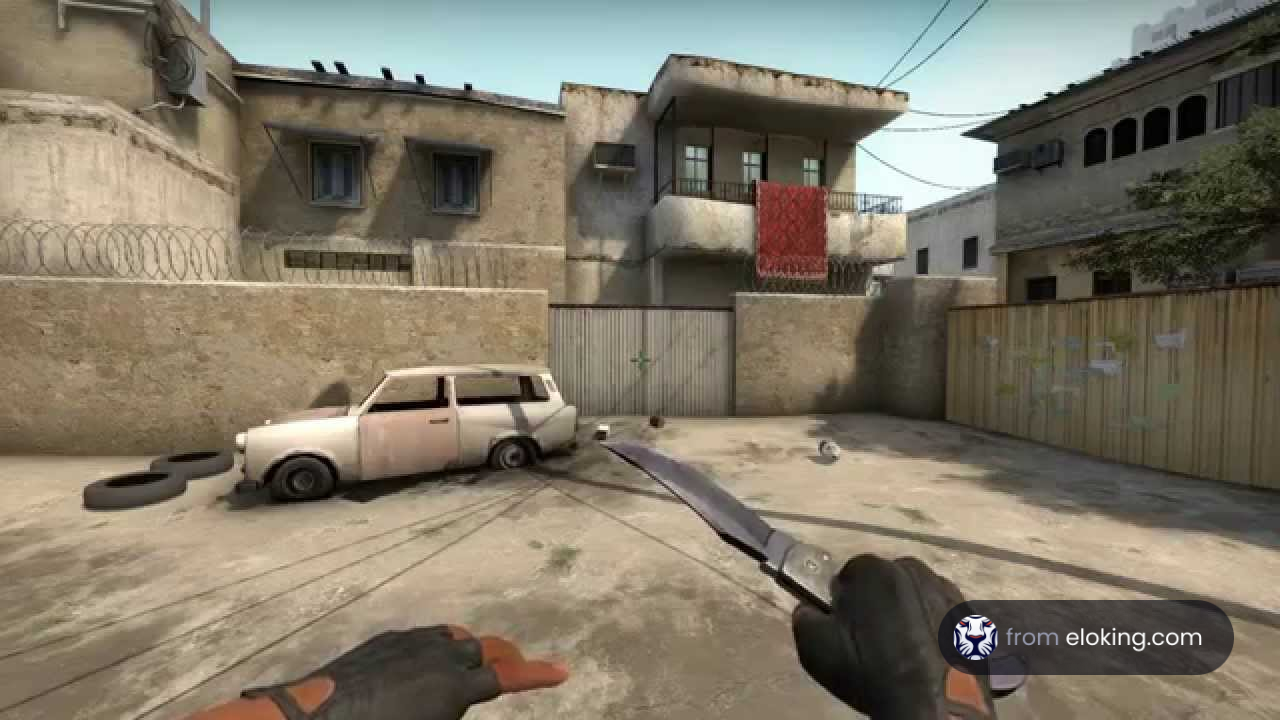 First-person view in a shooter game showing a knife and urban setting