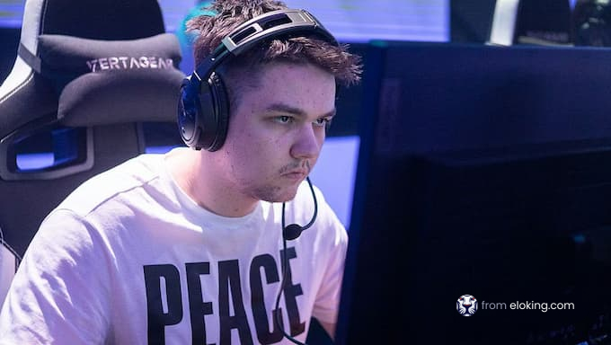 A focused gamer in action wearing a headset