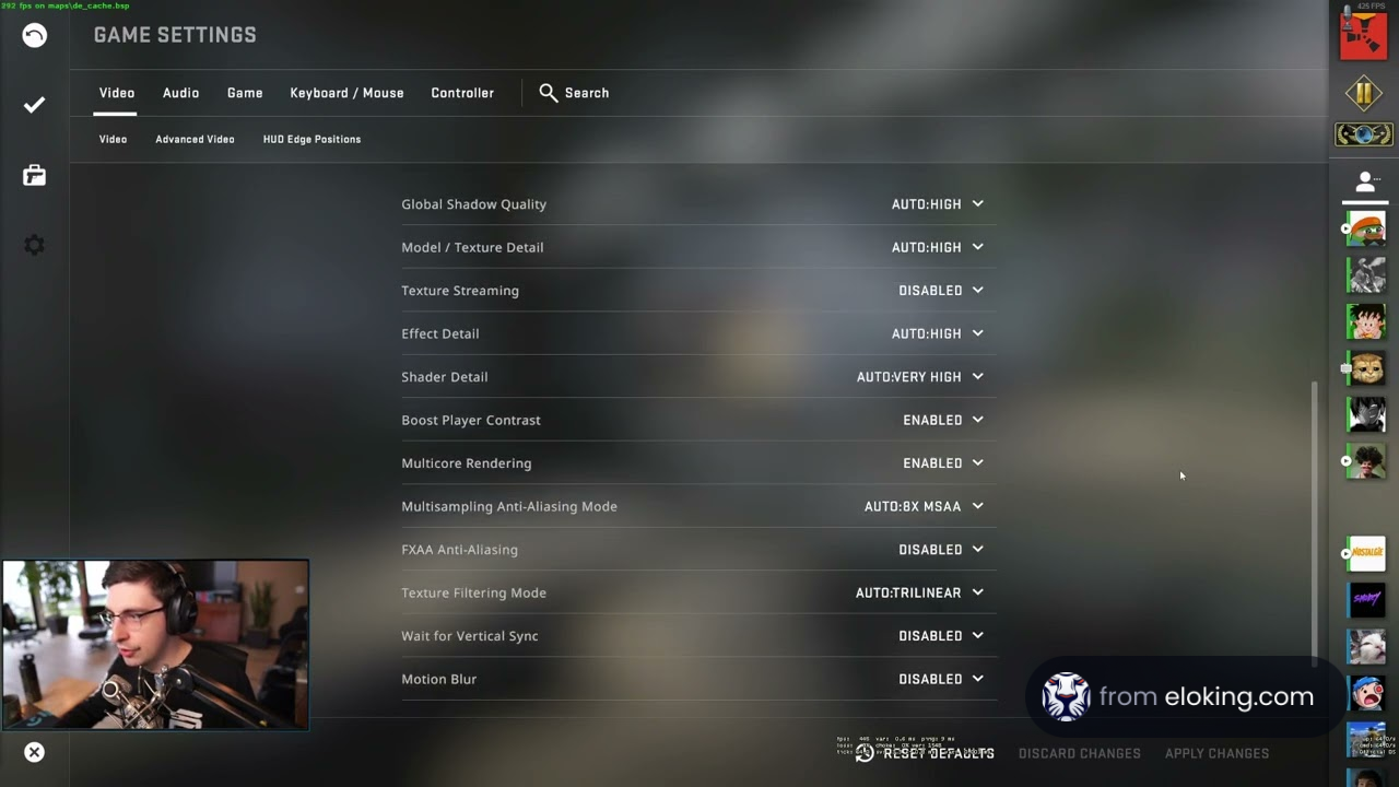 Gamer adjusting video settings on computer screen
