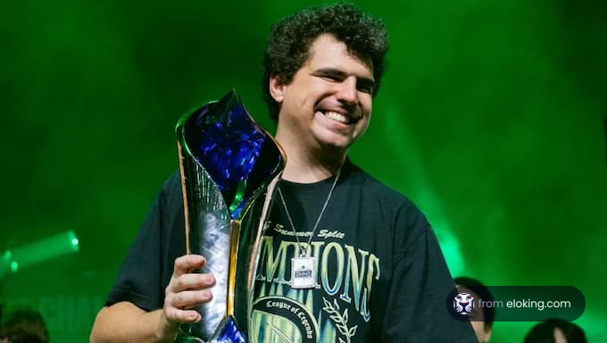 A happy champion holding a trophy in celebration