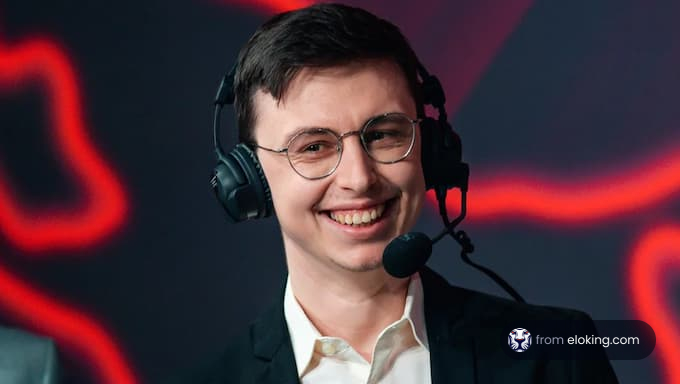A happy gaming host during a broadcast event.