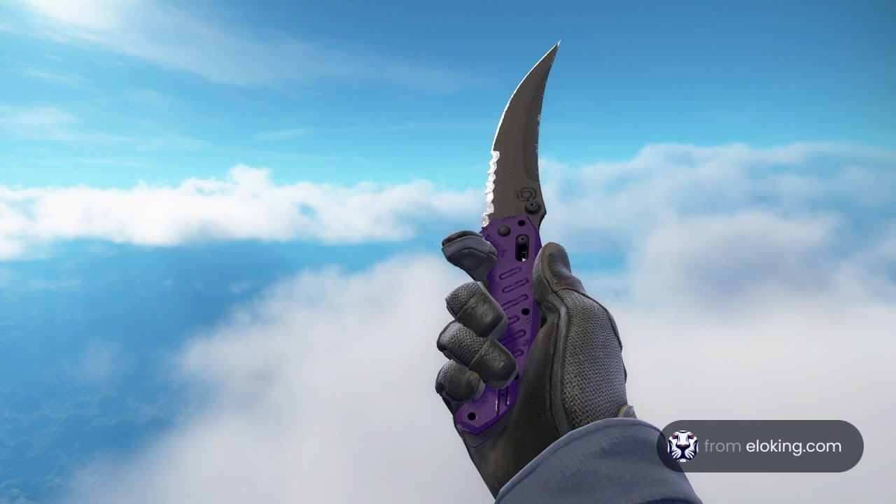 Close-up of a hand holding a purple folding knife high in the sky with clouds in the background