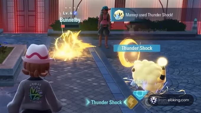 Bunnelby utilisant Éclair contre Mareep dans une bataille Pokémon.