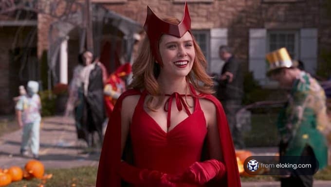 A woman dressed as the Scarlet Witch enjoying a Halloween event.
