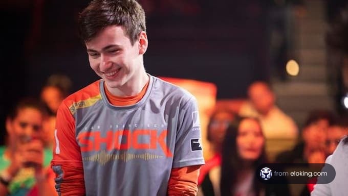 Young esports player smiling during a game event