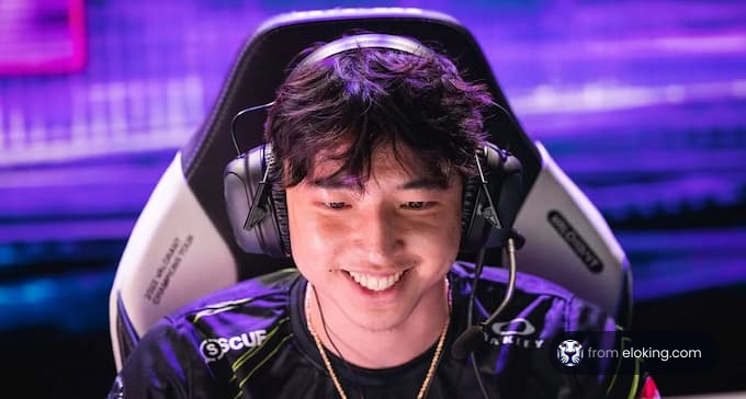 Smiling young man with headphones in an esports environment
