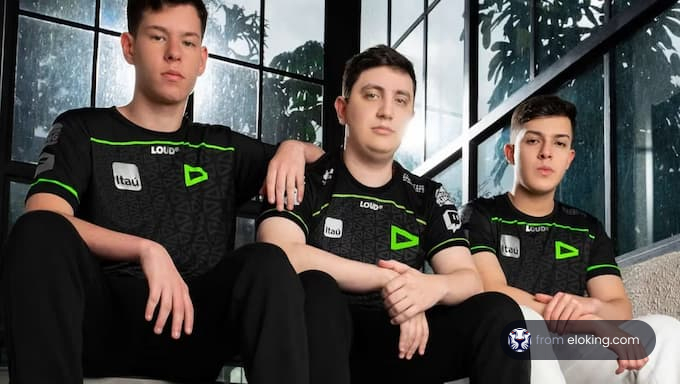 Three members of a top esports team posing for a portrait indoors.