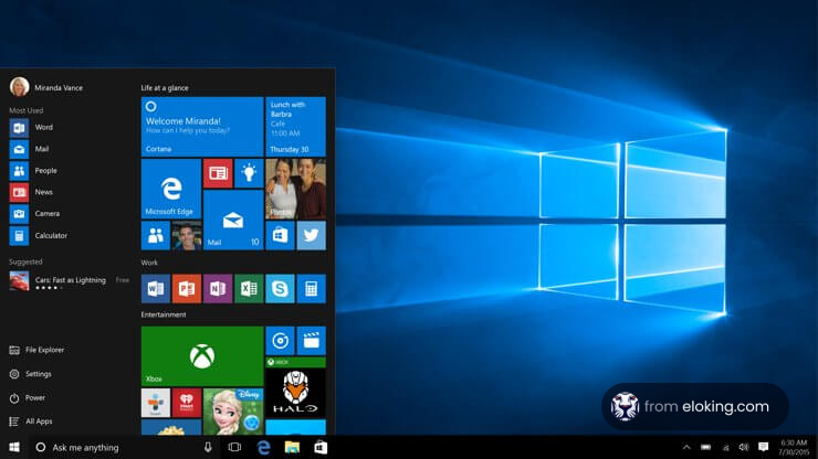 Windows 10 desktop screen showing start menu and wallpaper